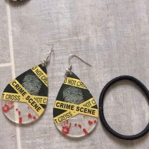 True crime earrings. Never worn, perfect condition.
